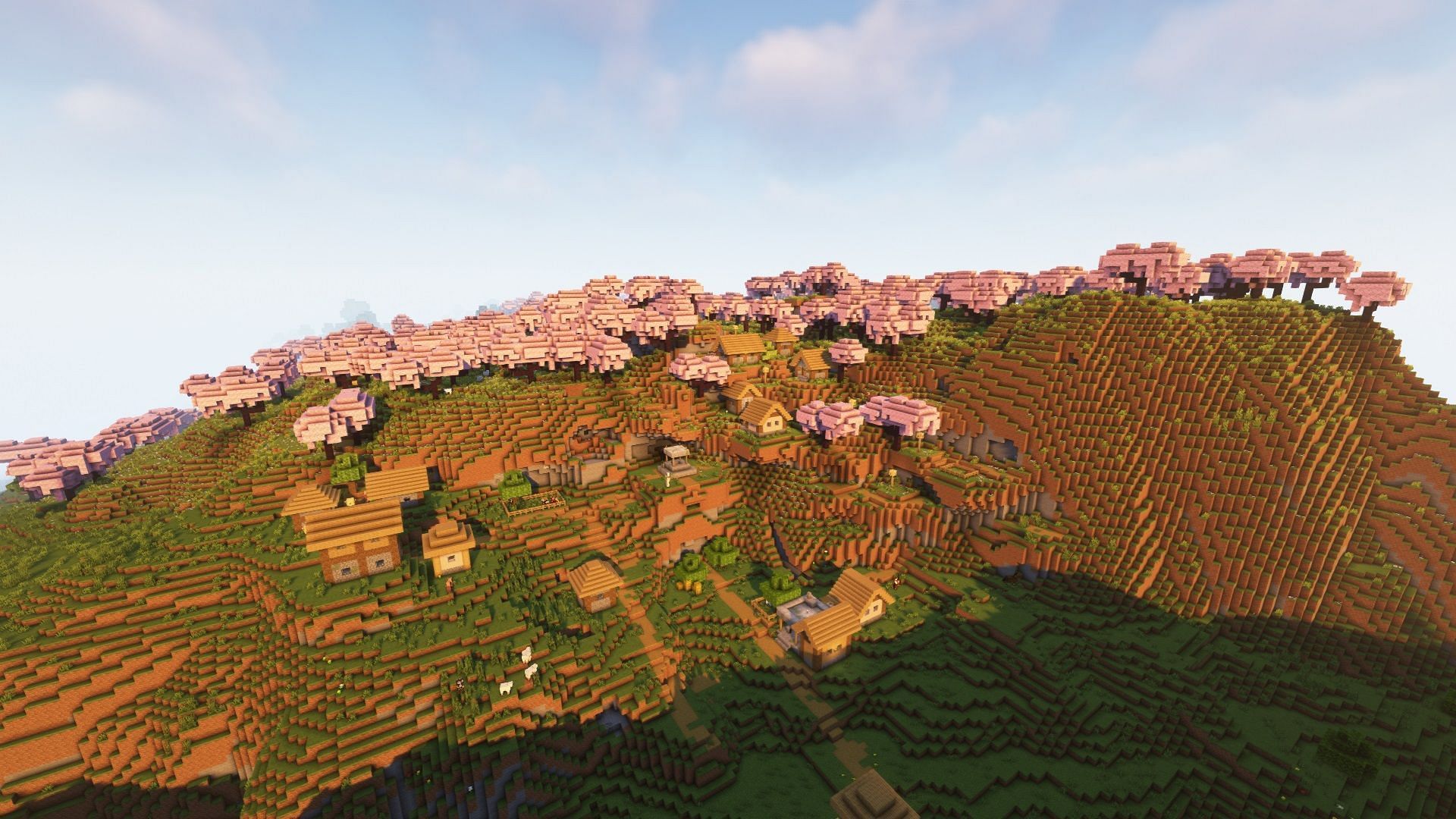 Cherry groves biome and a plains biome village (Image via Mojang)